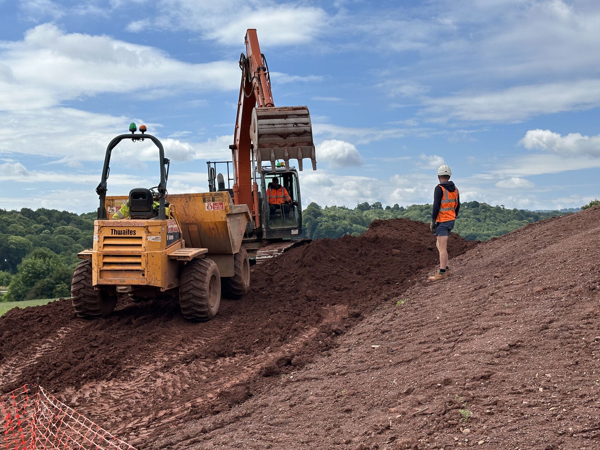 large digger doing earthworks groundworks in devon
