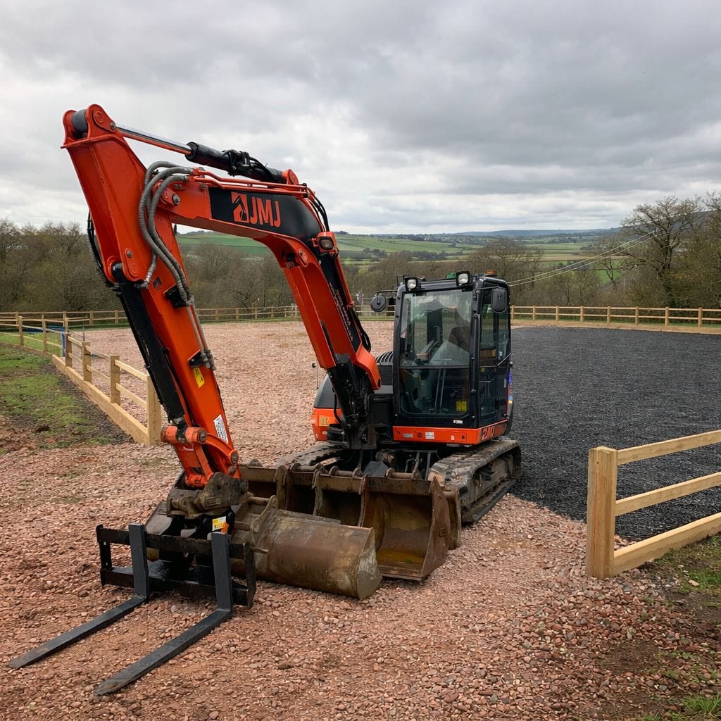 jmj groundworks digger contructing equestrian pen